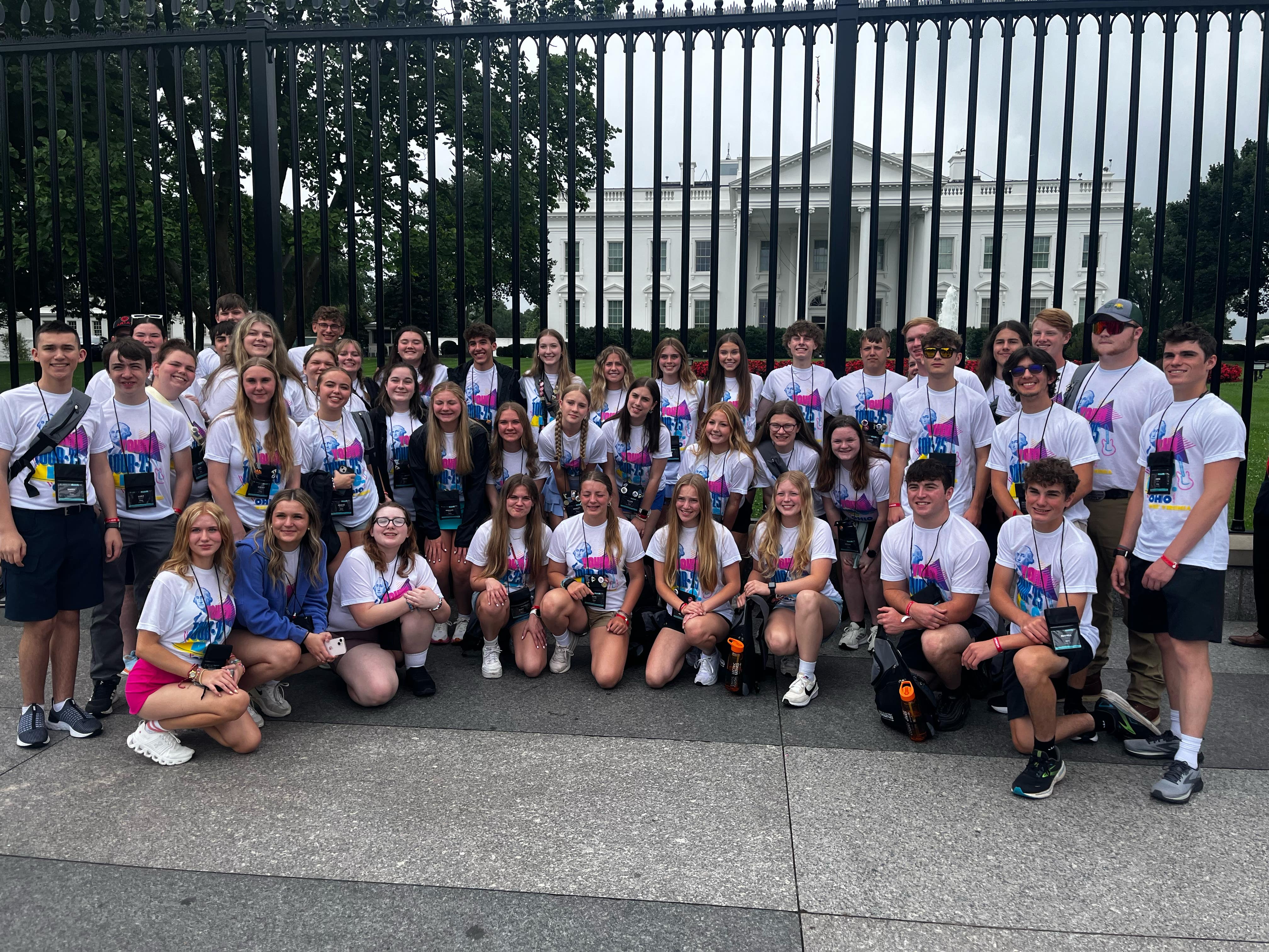 group of students in front of the fence at the White House