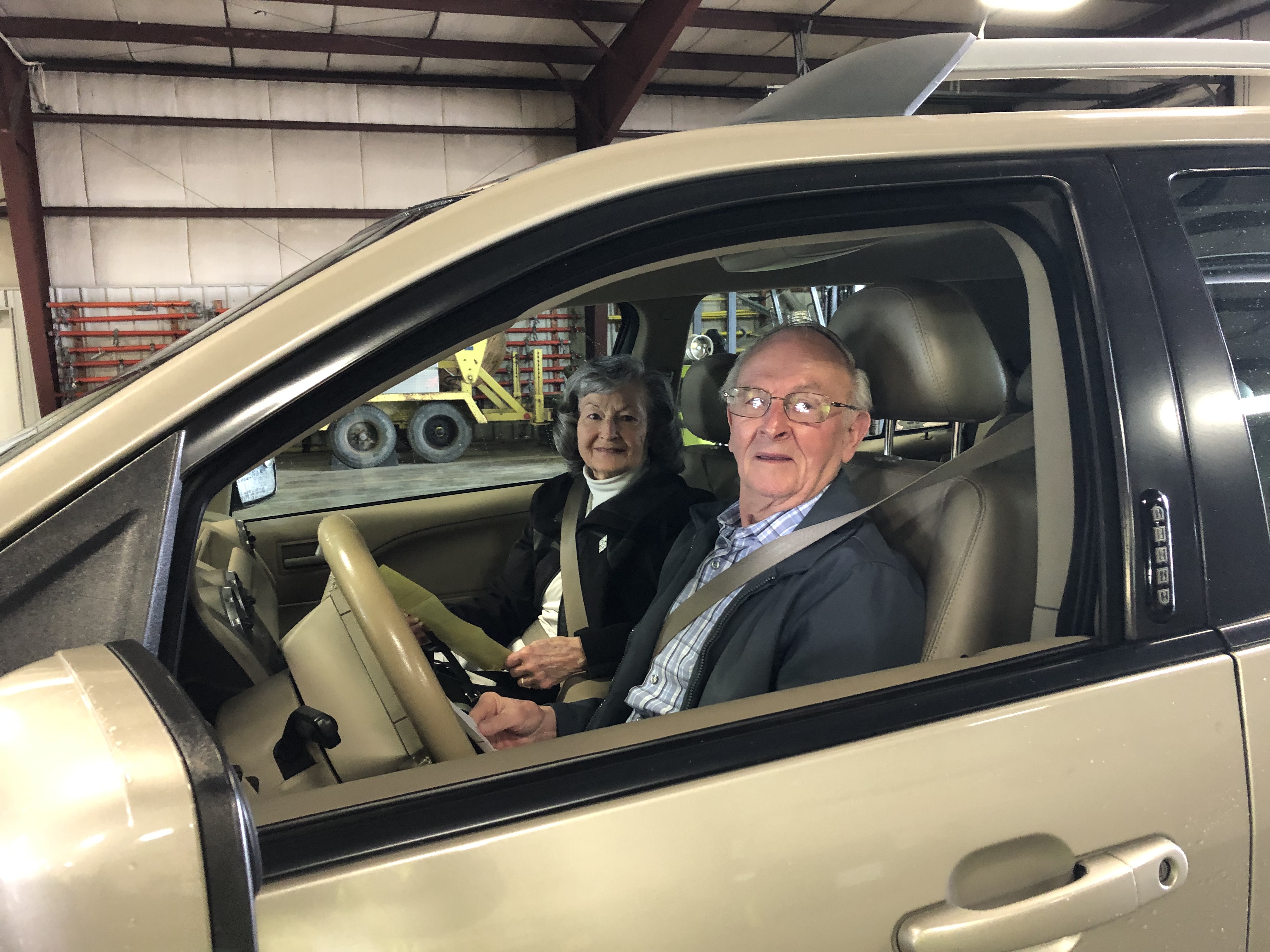 NWEC member-owners in their car at the drive-thru annual meeting 